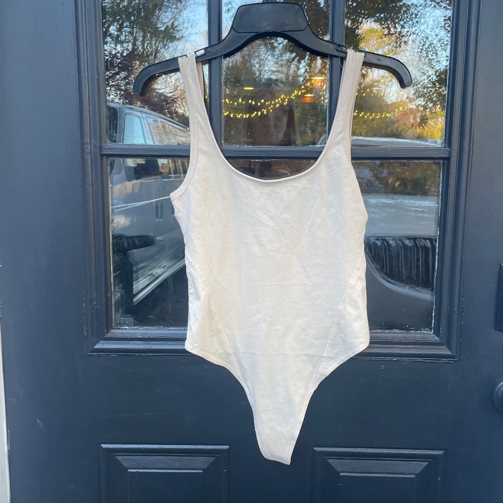 NWOT Free People Movement Cream / Nude Colored Sleeveless Tank Bodysuit Sz S
